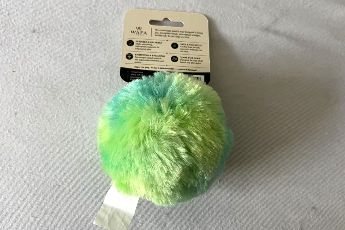 WAFA Monster Ball plush dog toy, back of retail card